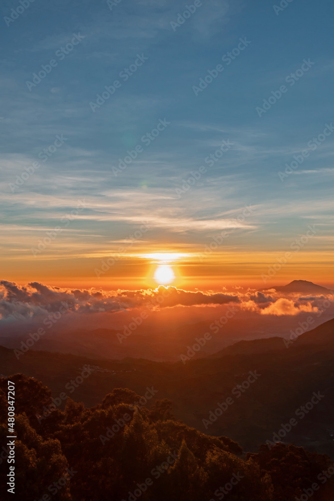 Amazing Golden Sunrise With Amazing Views On The Top Of Sikunir Hills, Dieng Plateau, Central Java, Indonesia Amazing Golden Sunrise With Amazing Views On The Top Of Sikunir Hills, Dieng Plateau, Central Java, Indonesia