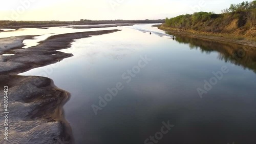 Drone Shot of Jetskis cruising down Saskatchewan River, SK, Canada photo