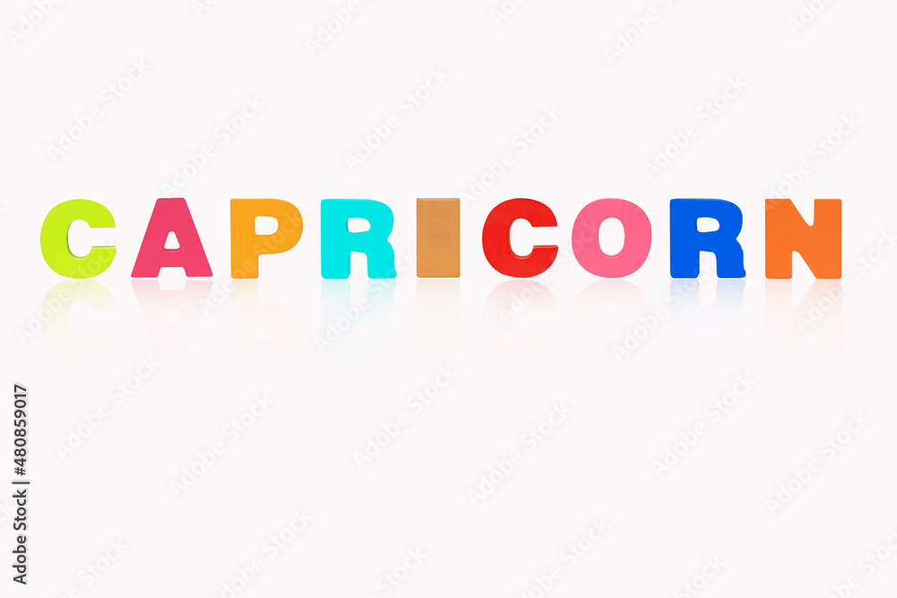 Name CAPRICORN is in 12 Zodiac isolated on white background. Colorful wooden alphabets set sort. English letter made of wood arrange alphabet as categorize suitable for children. Poster, banner design Name CAPRICORN is in 12 Zodiac isolated on white background. Colorful wooden alphabets set sort. English letter made of wood arrange alphabet as categorize suitable for children. Poster, banner design