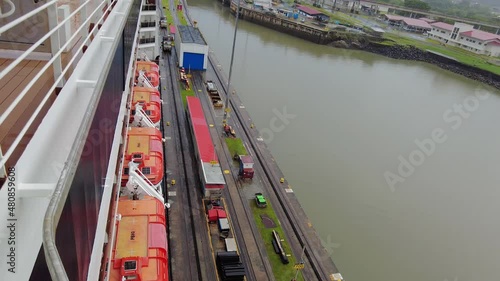 Revealing boarside of cruise ship at entry to Miraflores Locks at Panama Canal photo