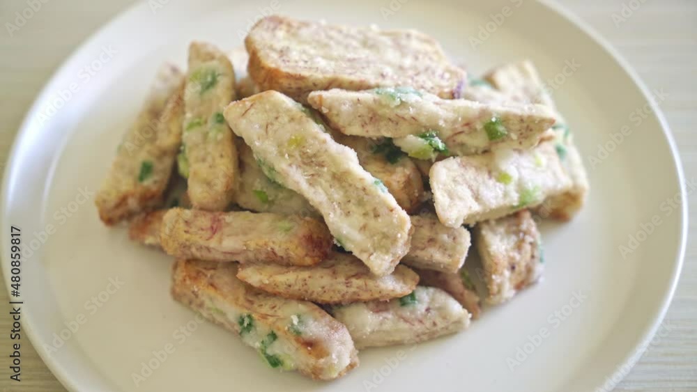 Sugar Coated Taro or Crispy Sweet Snow Taro on plate Sugar Coated Taro or Crispy Sweet Snow Taro on plate