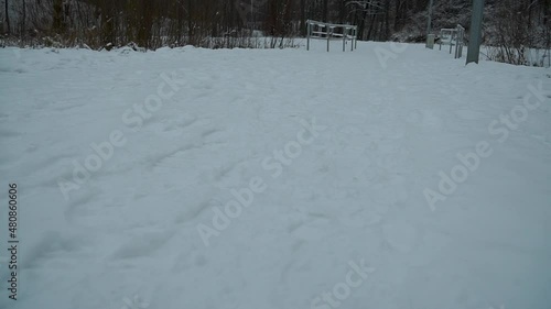 Wallpaper Mural POV shot of person walking over a field completly covered of white snow landscape Torontodigital.ca