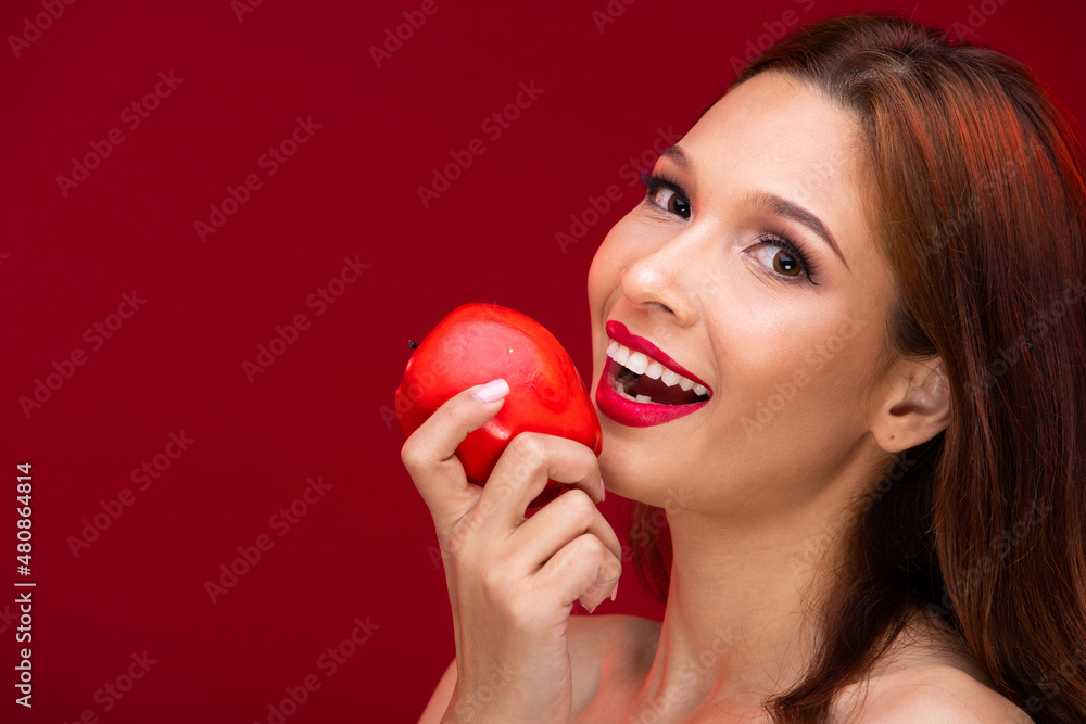 Caucasian Woman hold apple fresh fruit with big teeth smile Red background Caucasian Woman hold apple fresh fruit with big teeth smile Red background