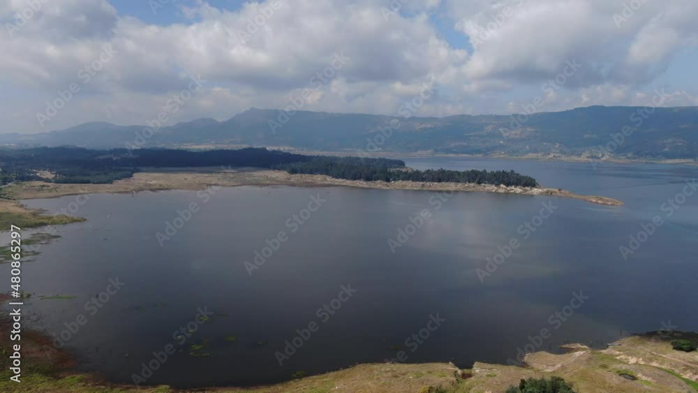 aerial drone view of the guatavita lagoon in Colombia. lakes and skies beautiful lagoon in Cundinamarca, Colombia aerial drone view of the guatavita lagoon in Colombia. lakes and skies beautiful lagoon in Cundinamarca, Colombia