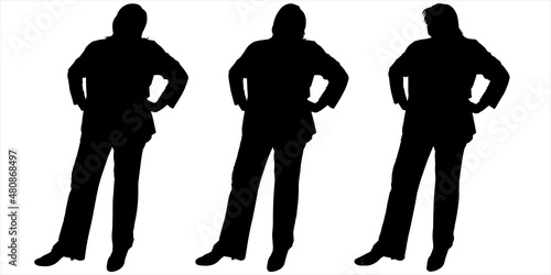 The woman stands straight, holds her hands on her belt, puts forward her leg. Business lady in a business suit. Successful businesswoman. Three black female silhouettes isolated on white background.