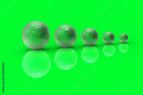 Five balls of metal of different sizes of Green color on Neon Green background. Growth of something. Progress. Reflection. Horizontal image. 3D image. 3D rendering.