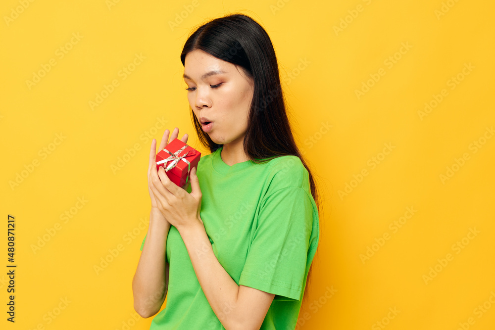 Portrait Asian beautiful young woman Red gift box happy Birthday isolated background unaltered Portrait Asian beautiful young woman Red gift box happy Birthday isolated background unaltered
