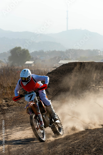 jumping on a motorcycle. motocross. motorcycle racing. bikers on the track