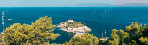 Kusadasi, Aydin Province, Turkey. Top View Of The Pigeon Island. Old 14th-15th Century Fortress On Guvercin Adasi In The Aegean Sea. Bird Island