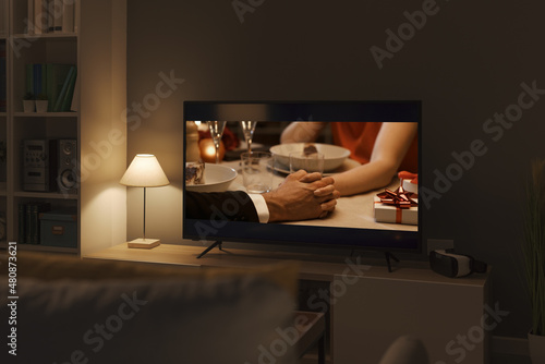 Billede på lærred Romantic movie streaming on TV