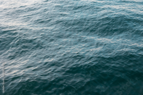 Sea background. Abstract background of texture of the calm sea © senerdagasan