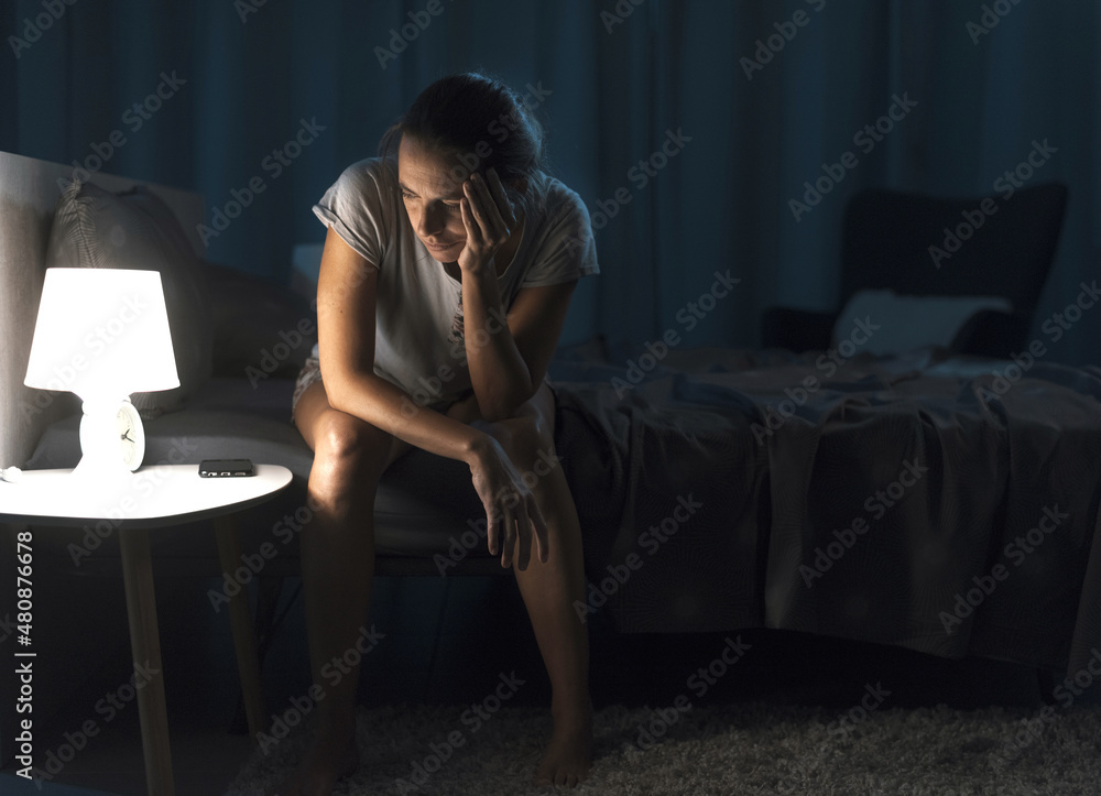 Exhausted woman suffering from insomnia - obrazy, fototapety, plakaty 