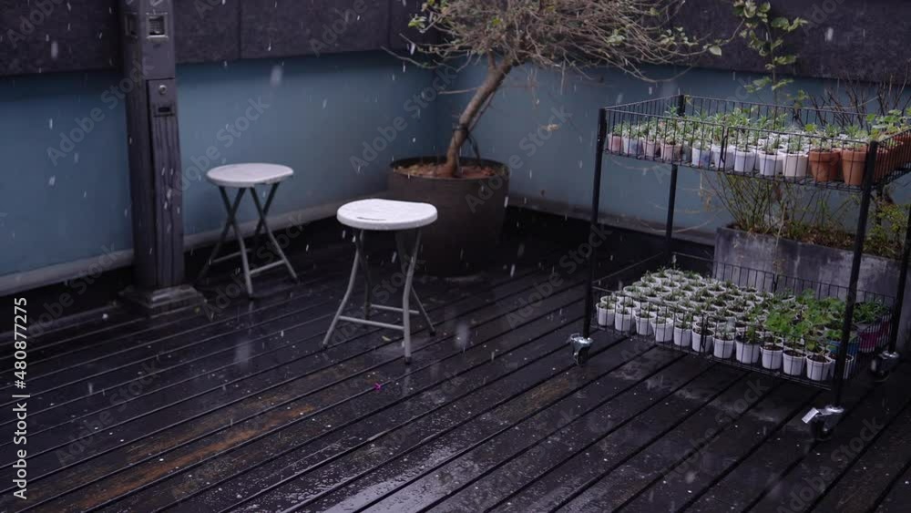 snow on dirty wood floor on terrace snow on dirty wood floor on terrace