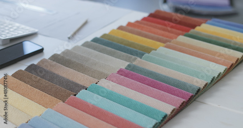 Fabric swatches on a decorator's desk