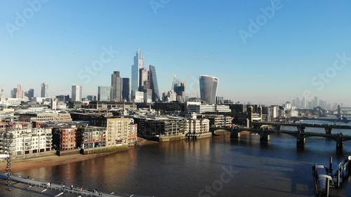 Aerial view of London's Financial District against the blue sky on a sunny day photo