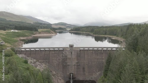 Flying over Laggan Dam, located on the River Spean south west of Loch Laggan in the scottish highlands. photo