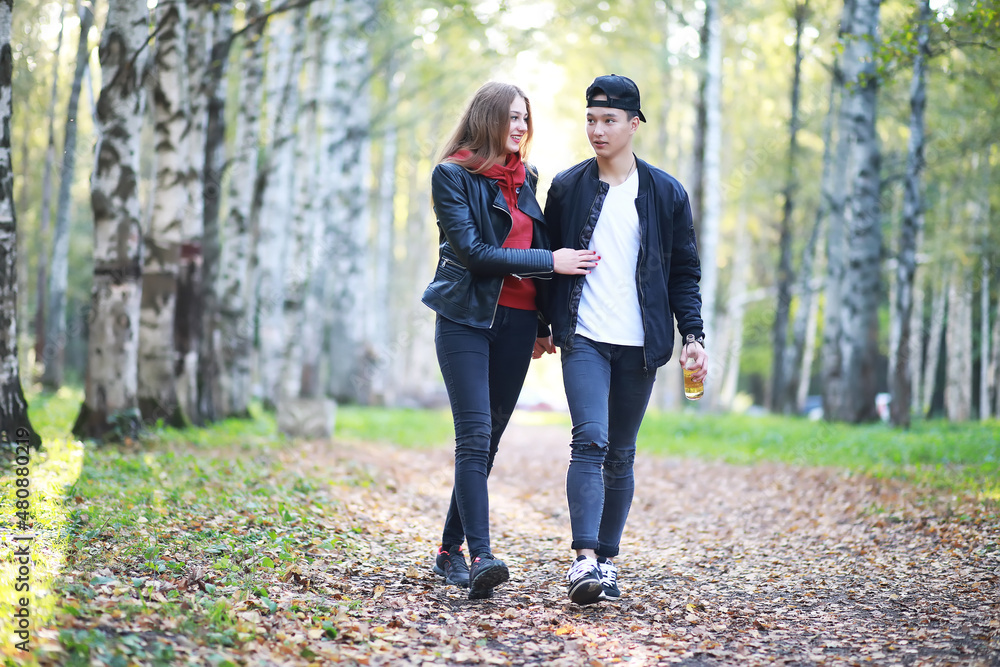 Loving couple walking in casual clothes