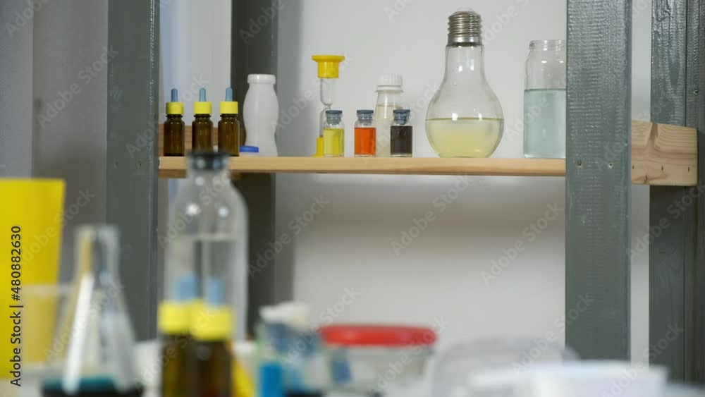 Home school chemistry class laboratory with reagents, jars, flasks and test tubes. Equipment for experiments. Homeschooling, education, science concept. Chemical classroom. Home school chemistry class laboratory with reagents, jars, flasks and test tubes. Equipment for experiments. Homeschooling, education, science concept. Chemical classroom.