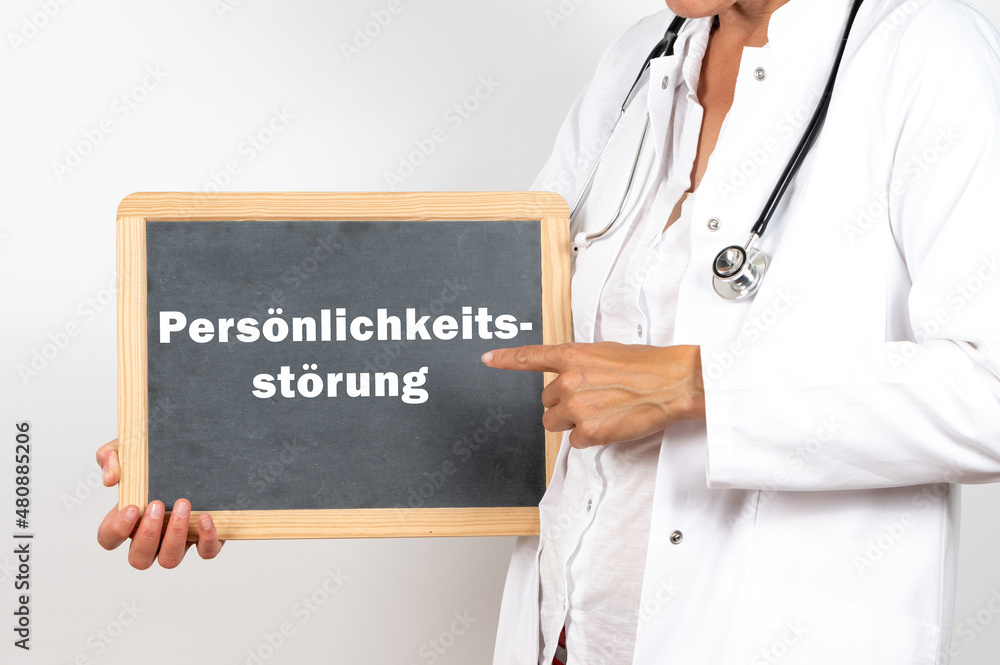 Eine Ärztin oder Psychologin zeigt auf eine Tafel auf der Persönlichkeitsstörung steht Eine Ärztin oder Psychologin zeigt auf eine Tafel auf der Persönlichkeitsstörung steht