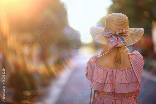 tourism summer old town female, europe mediterranean, young woman traveler, back straw hat view © kichigin19