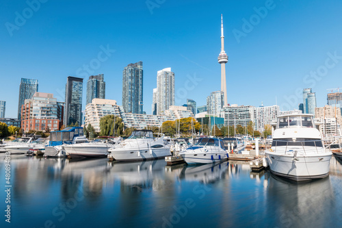 Canada, Ontario, Toronto, Yachts moored in city marina photo