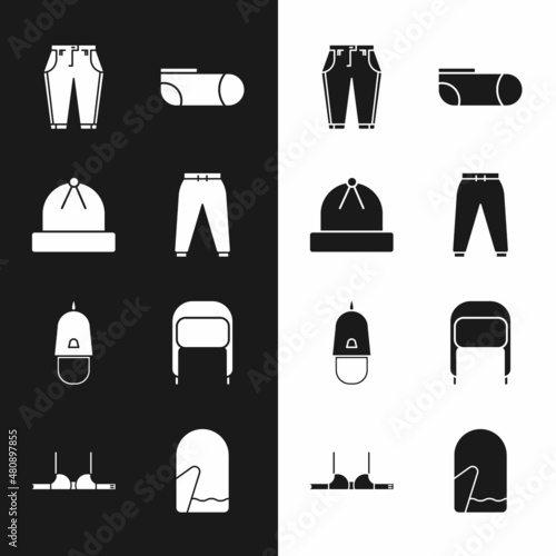 Set Sport pants, Winter hat, Pants, socks, Police cap with cockade, ear flaps, Christmas mitten and Bra icon. Vector