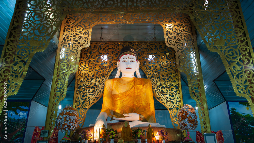 Burmese Buddha statue in the ancient Buddhist temple.