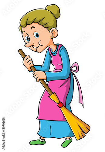 The old woman is sweeping the yard with the broom stick