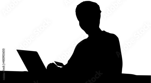 silhouette of a person with a laptop