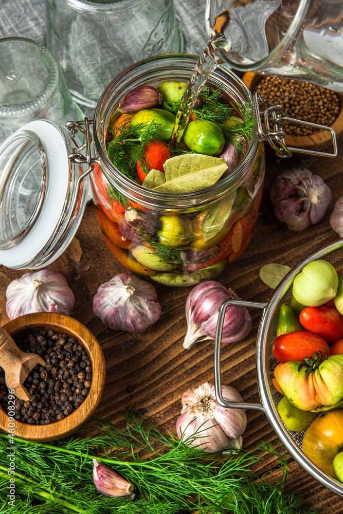 Pickled Tomatoes in Jar with Herbs and Garlic Pickled Tomatoes in Jar with Herbs and Garlic
