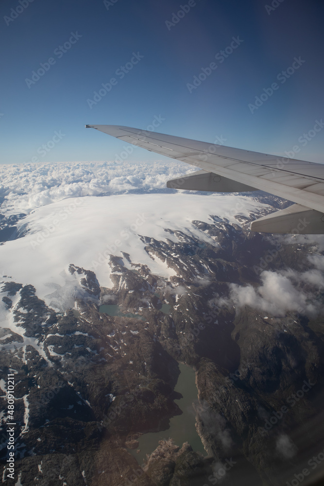 A beautiful viewa from abowe from the airplane window over the Norway. Travel photography of Northern Europe. A beautiful viewa from abowe from the airplane window over the Norway. Travel photography of Northern Europe.