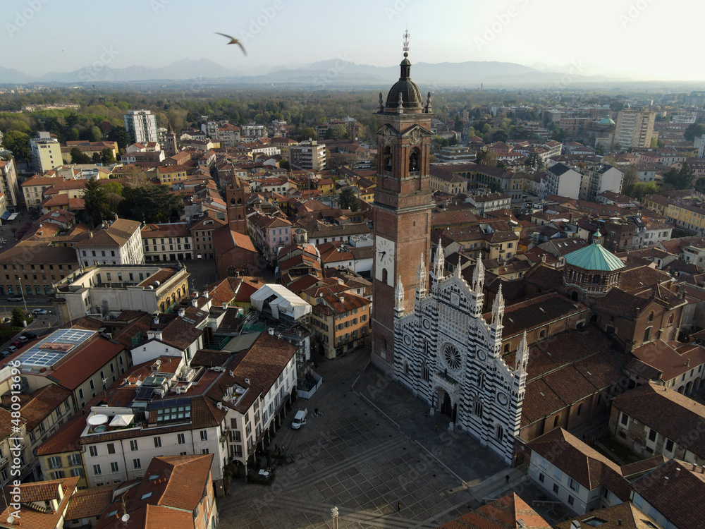 Aerial view of facade of the ancient Duomo in Monza (Monza Cathedral). Drone photography of the main square with church in Monza in north Italy, Brianza, Lombardia. - obrazy, fototapety, plakaty 