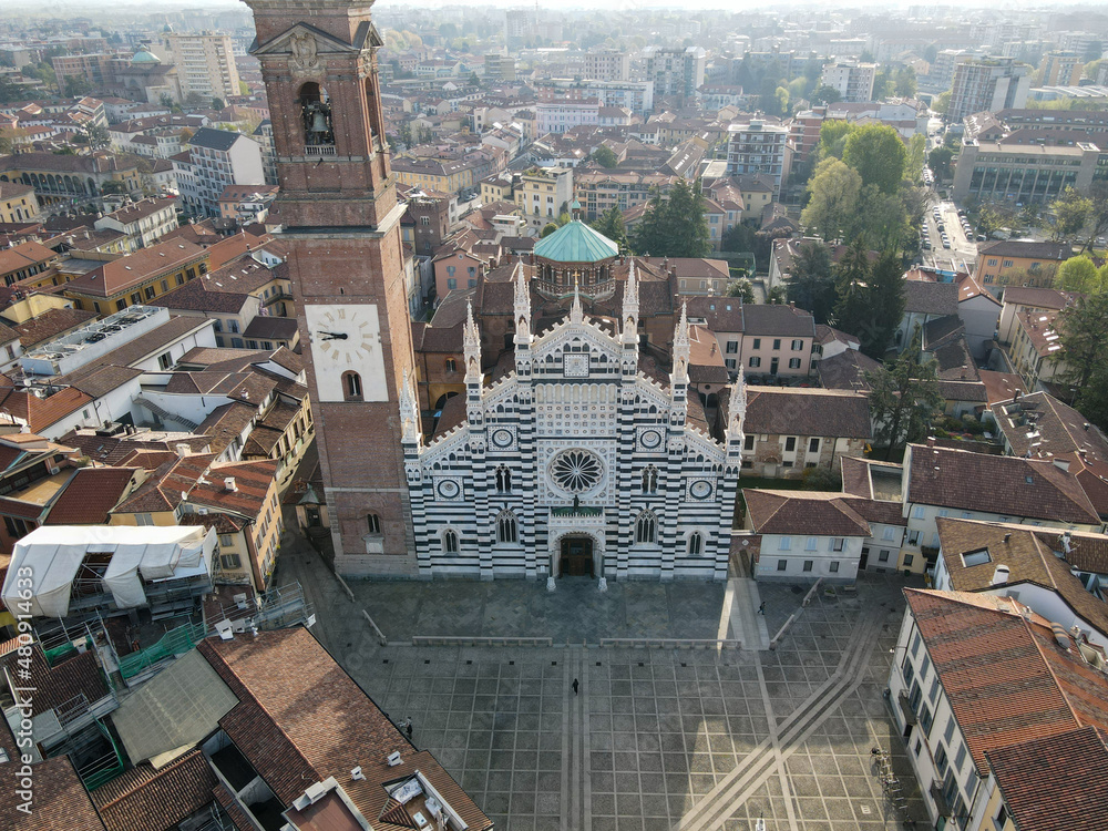 Fototapeta premium Aerial view of facade of the ancient Duomo in Monza (Monza Cathedral). Drone photography of the main square with church in Monza in north Italy, Brianza, Lombardia.