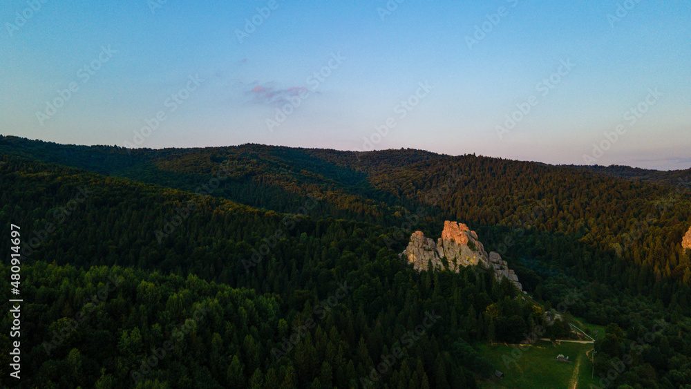 Obraz premium Mountains forest at sunset top view