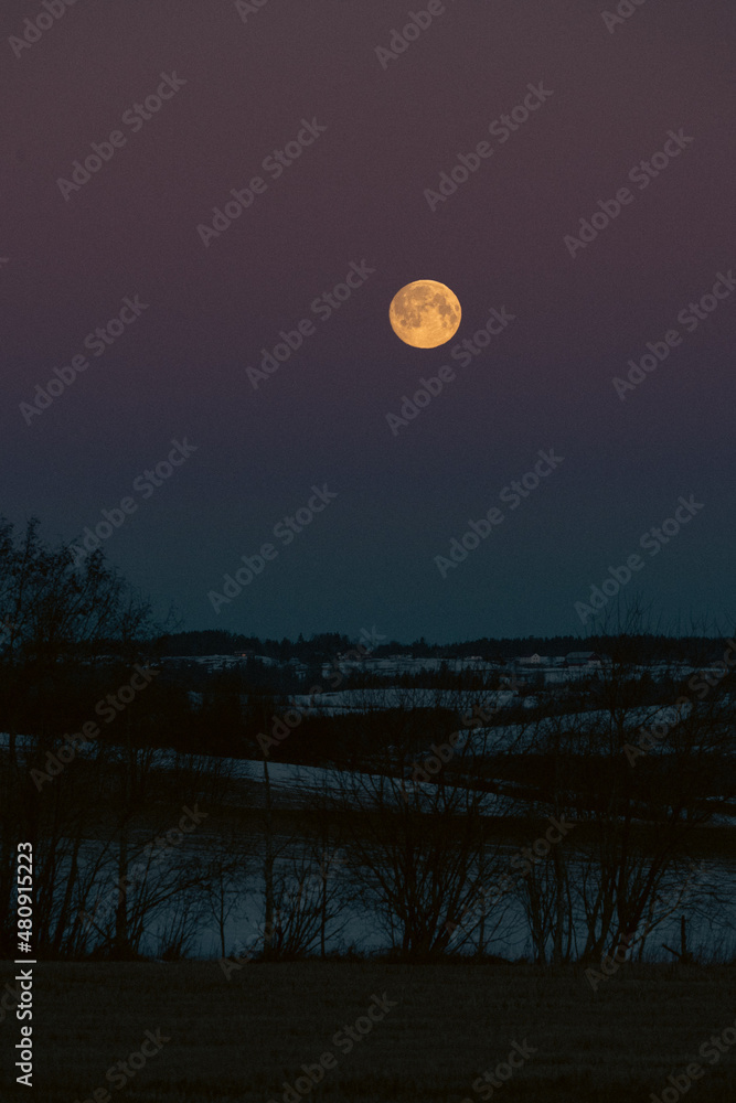 The full moon above rural Toten, Norway. The full moon above rural Toten, Norway.