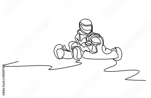Competitive person having fun on go kart track. Go kart track and driver for car racing to have fun in the city.