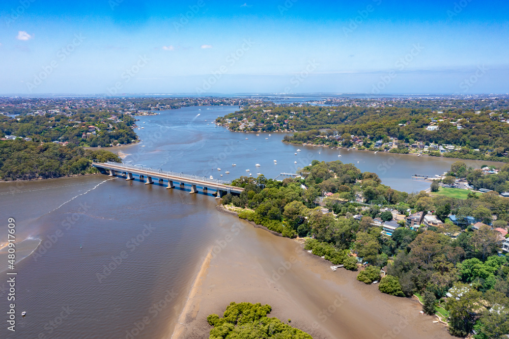 Aerial view of Como Bridge on the Georges River in southern Sydney, Australia during summer on a sunny day 