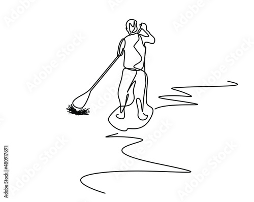 man calmly using canoe boat standing