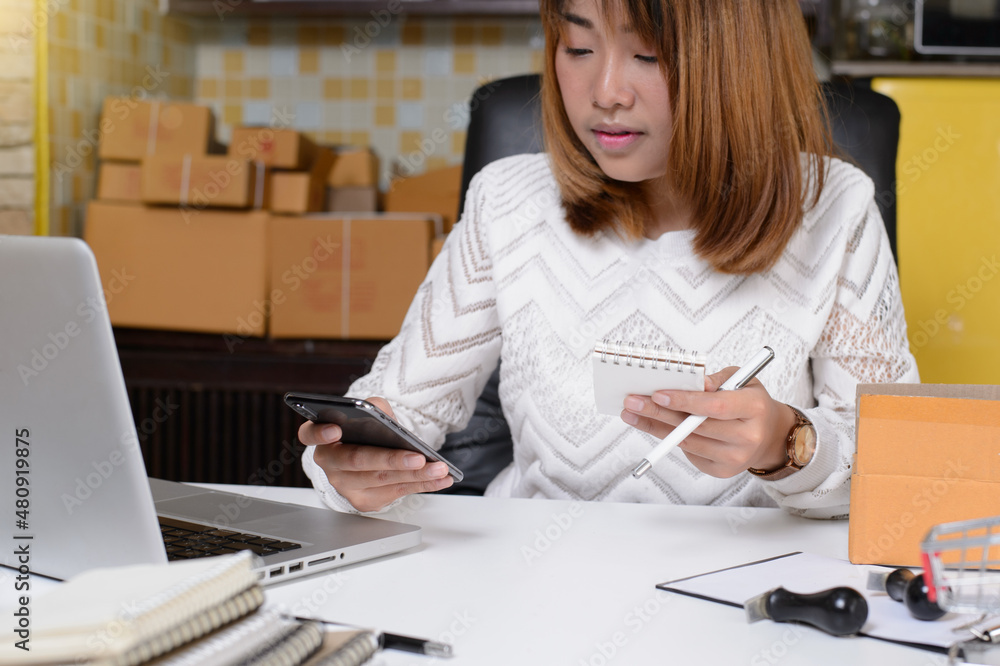 woman at the office of their business online woman at the office of their business online