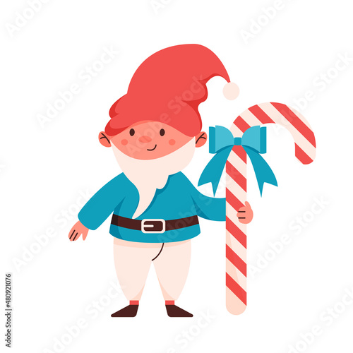 Cute Christmas gnome isolated flat vector illustration. Adorable little dwarf with sugarcane candy design element.