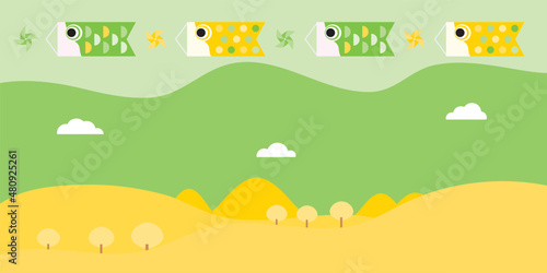 こどもの日に鯉幟が空を泳ぐ背景イラスト