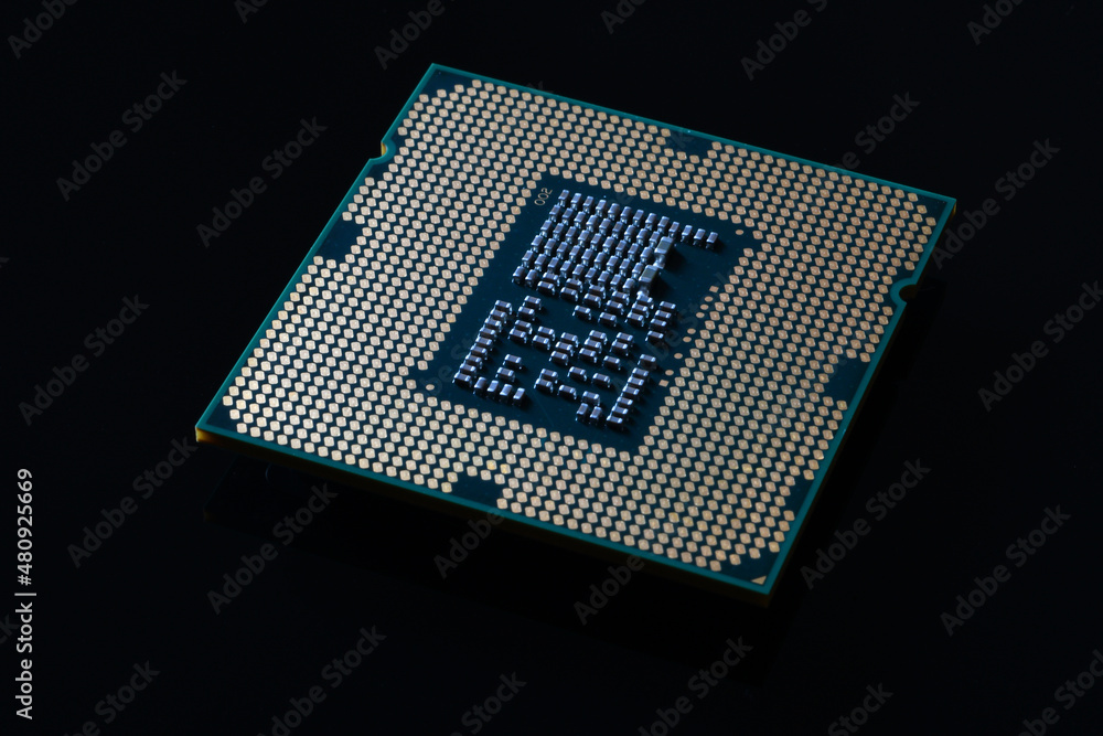 Close up of Computer Processor on Black Reflective Background Close up of Computer Processor on Black Reflective Background