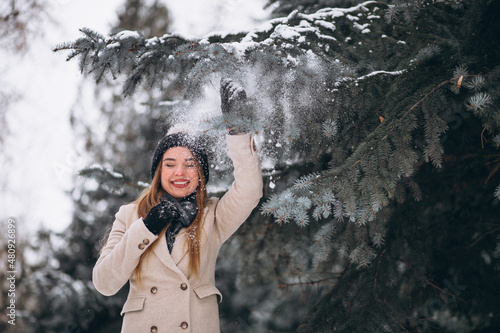 Woman happy in a winter park