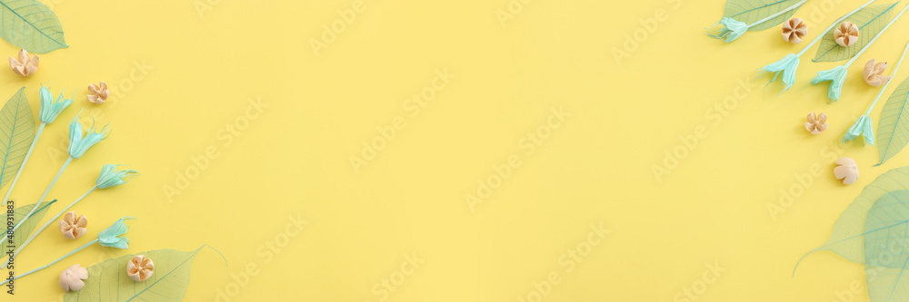 Top view image of autumn forest natural composition over yellow background .Flat lay Top view image of autumn forest natural composition over yellow background .Flat lay