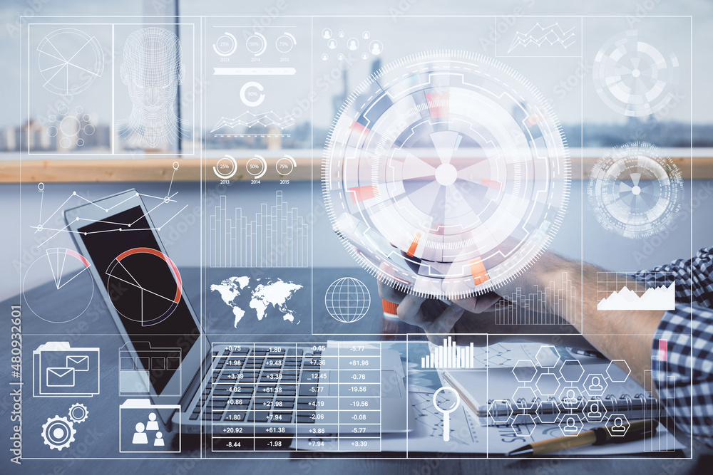Double exposure of man's hand holding and using a digital device and data theme hologram drawing. Technology concept. Double exposure of man's hand holding and using a digital device and data theme hologram drawing. Technology concept.