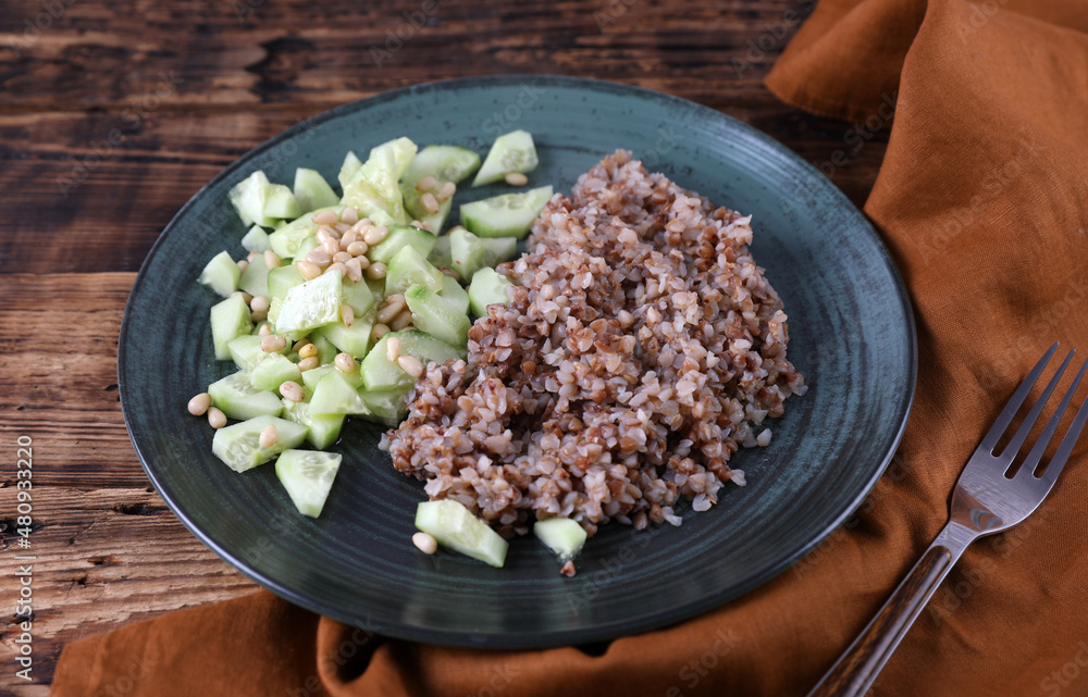Boiled buckwheat and cucumbers with olive oil and pine nuts Boiled buckwheat and cucumbers with olive oil and pine nuts