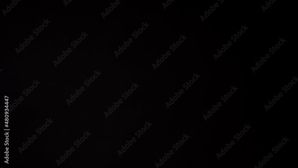 Giving five hundred euro banknotes on black background. Businessman receiving the bills of money, rich woman holding a stack of 500 euro in hands. Giving five hundred euro banknotes on black background. Businessman receiving the bills of money, rich woman holding a stack of 500 euro in hands.