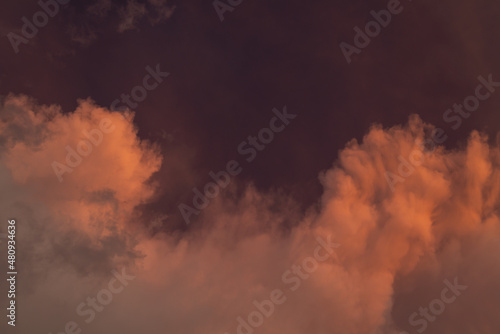 Red clouds in the evening sky were hit by sunlight, Summer sky, Soft focus.