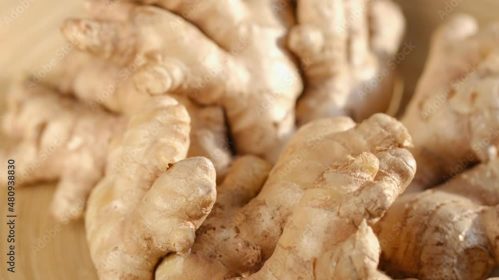 Whole ginger root on close up rotating 4K Whole ginger root on close up rotating 4K