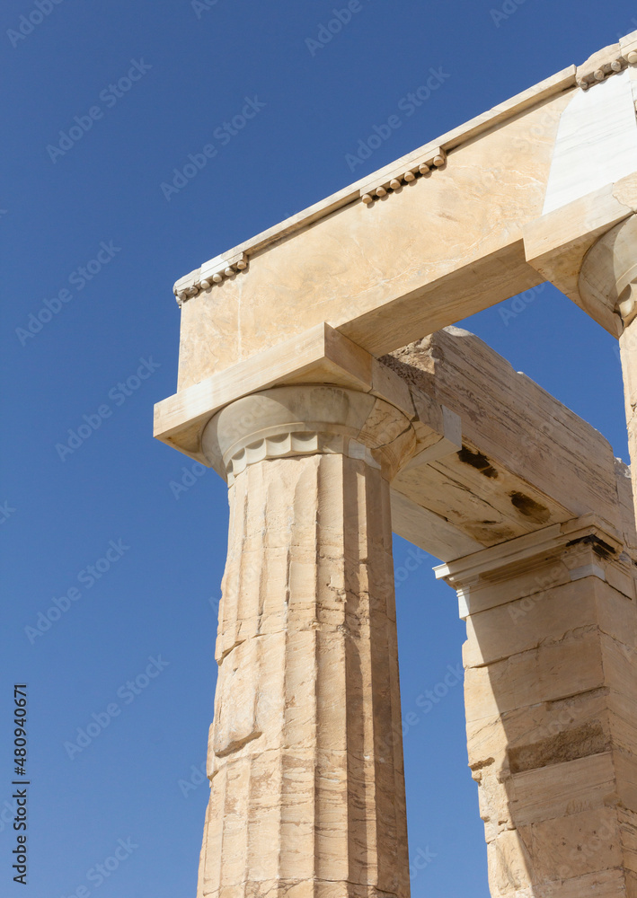 ancient greek temple, One Greek column aginst blue sky